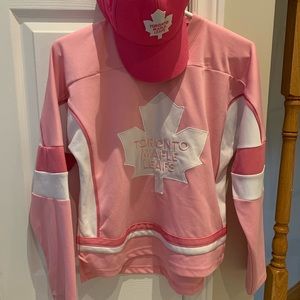 Leaf fans prep for the playoffs! Girls pink jersey and hat!